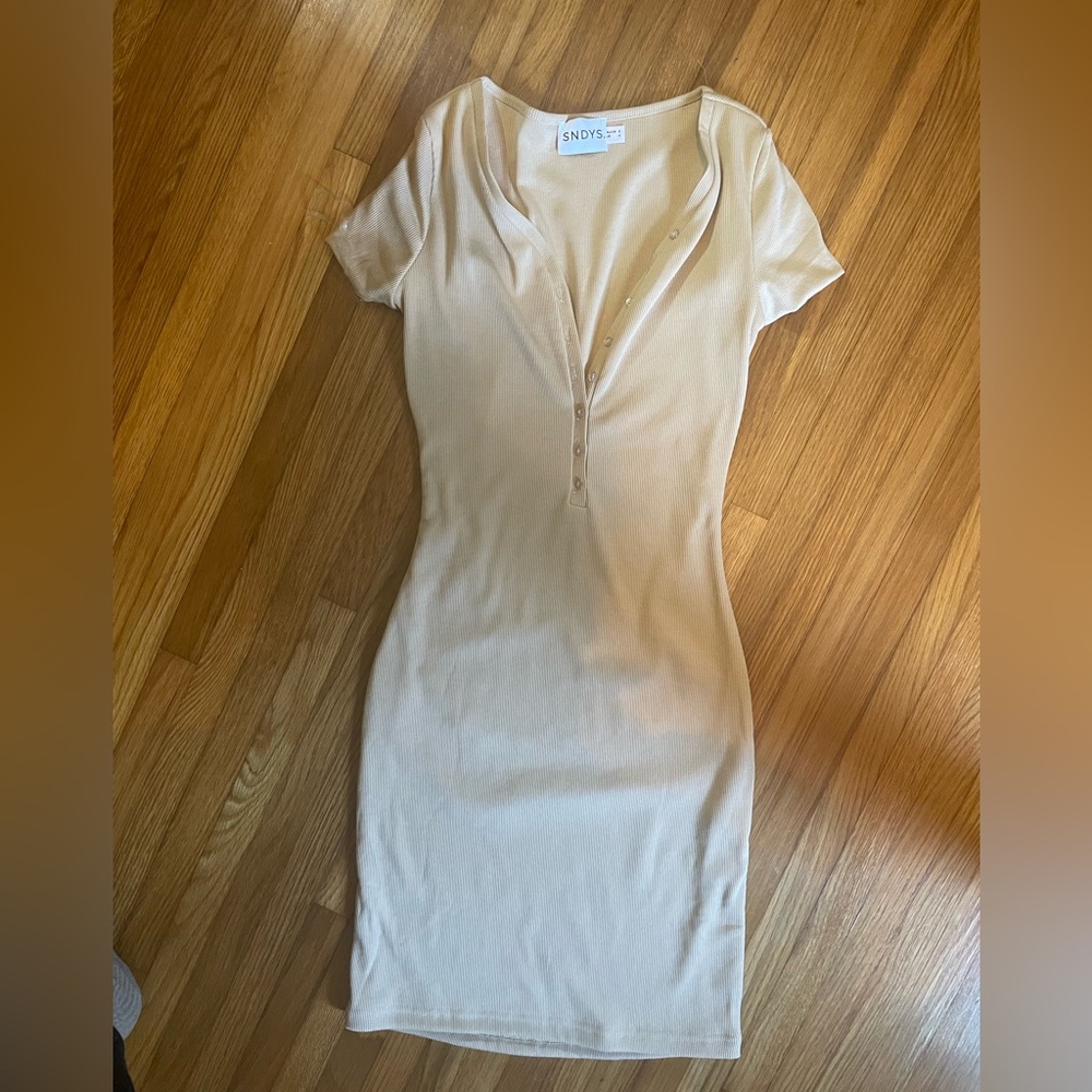 Tight tan mini dress